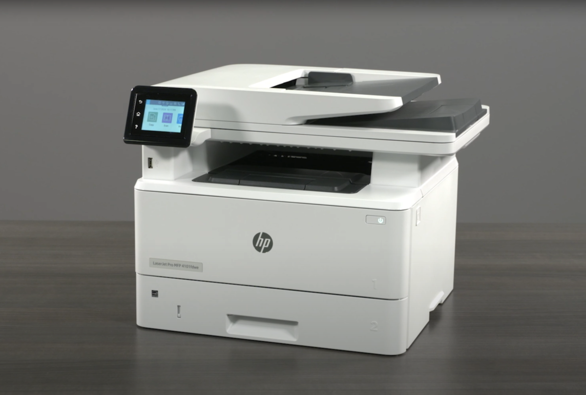 Modern multifunction printer used in a printer setup tutorial.