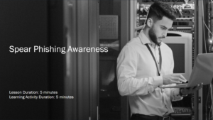 Man working on a laptop in a server room, representing a modern cybersecurity course on spear phishing awareness, emphasizing quick learning activities and key defenses against phishing attacks.