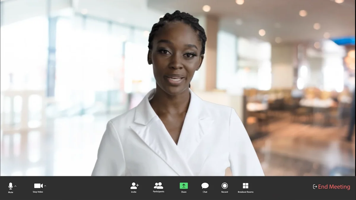 AI avatar speaking in a simulated Zoom call for a customs compliance microlesson about free-of-charge goods.